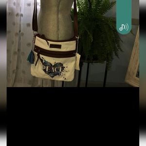 NWT has a matching wallet that was used both for one price